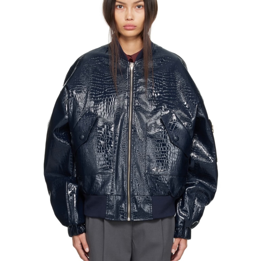 THE FRANKIE SHOP
Navy Hane Faux-Leather Bomber Jacket